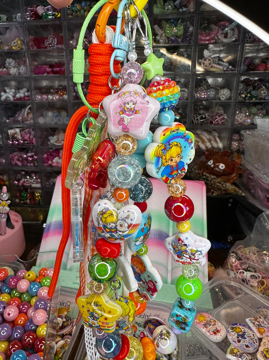 Rainbow Retro Cartoon Bag Charm | Colorful Beaded Nostalgia Keychain
$36