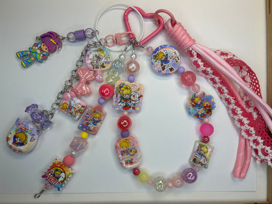 Pastel Rainbow Retro Bag Charm | Pink & Purple Nostalgia Beaded Keychain $36