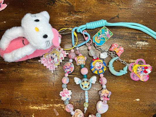 🌙🎀 Sailor Moon x Hello Kitty Purse Chain ✨$38