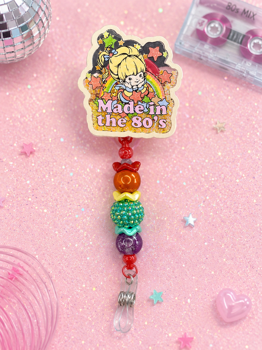 🌈 Made in the 80’s Spinning Shaker Beaded Badge Reel